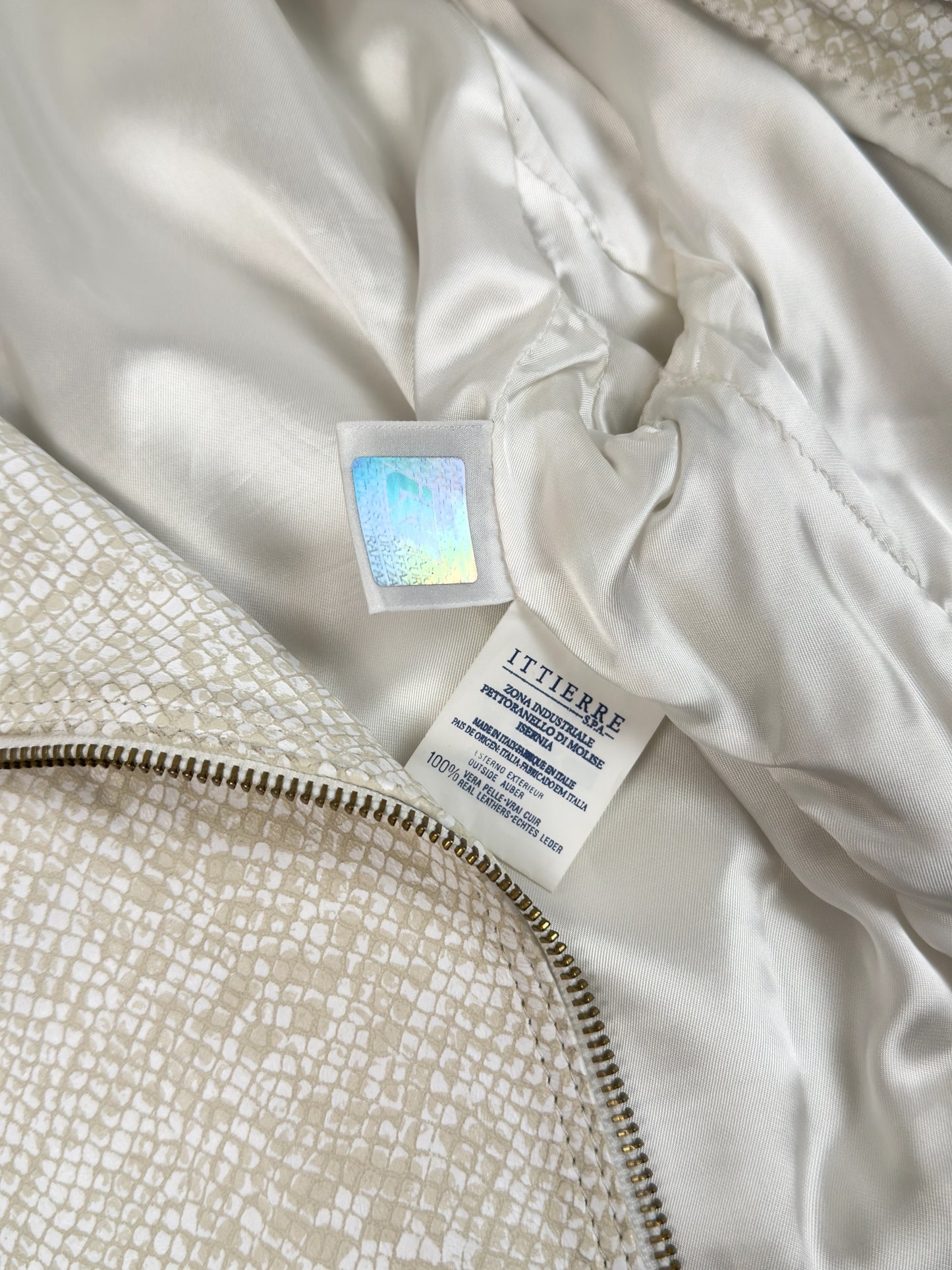 Versus by Gianni Versace 1990s beige python-effect leather jacket with gold hardware.