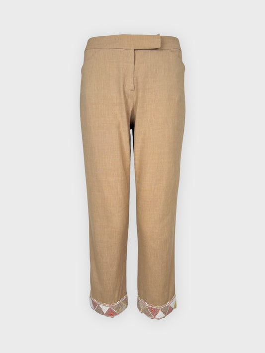 Blumarine 2000s linen capri trousers with beaded hem and floral appliqués.