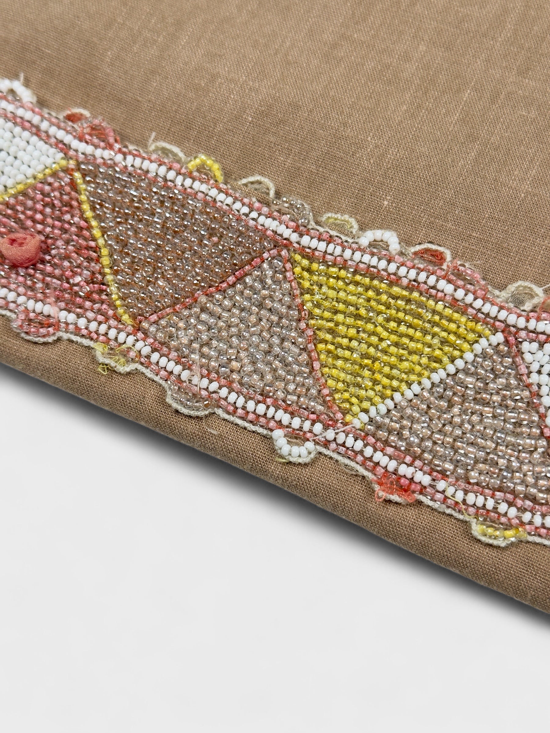 Blumarine 2000s linen capri trousers with beaded hem and floral appliqués.