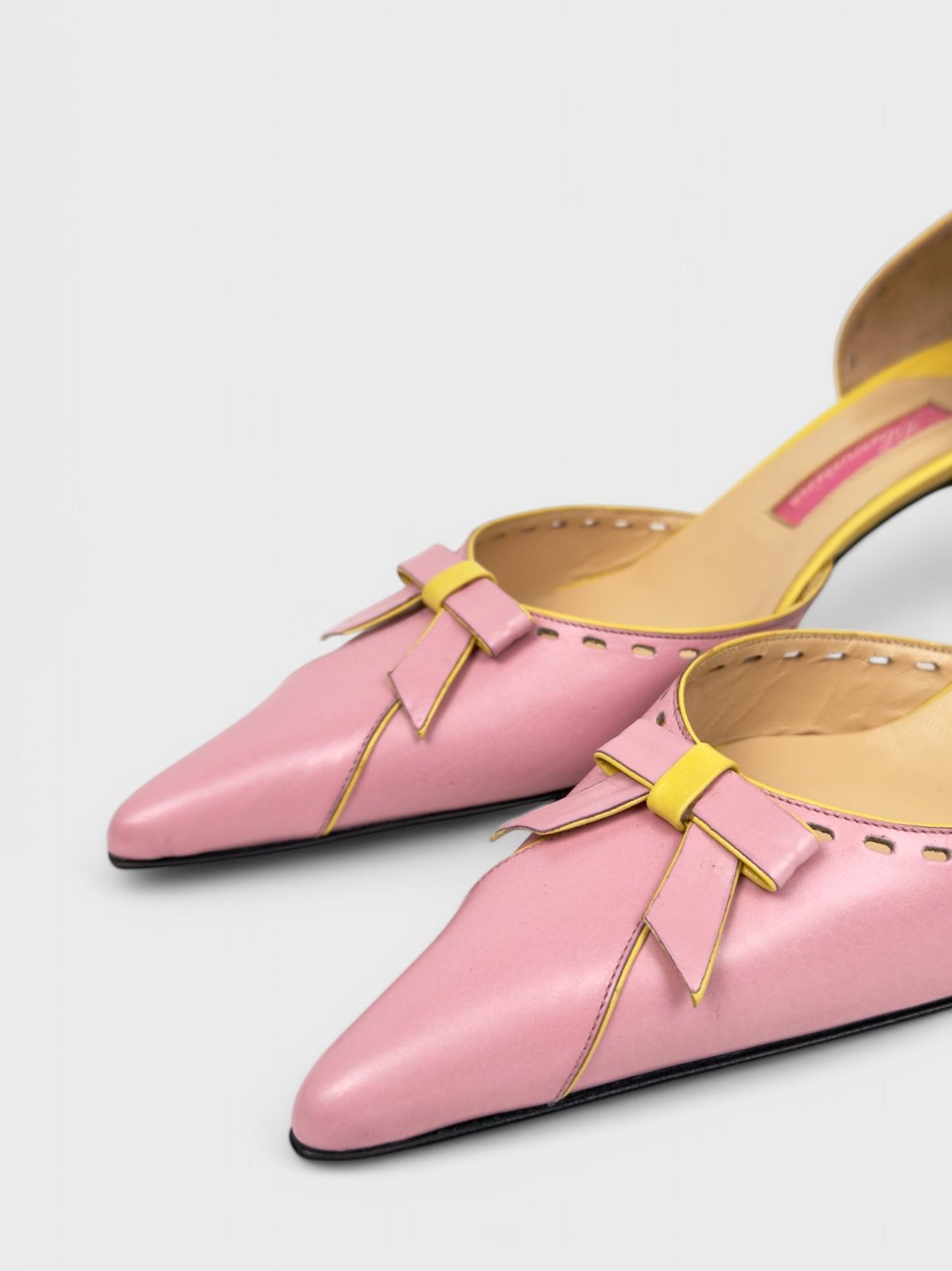 Blumarine mid-2000s pink and yellow leather kitten heel pumps.