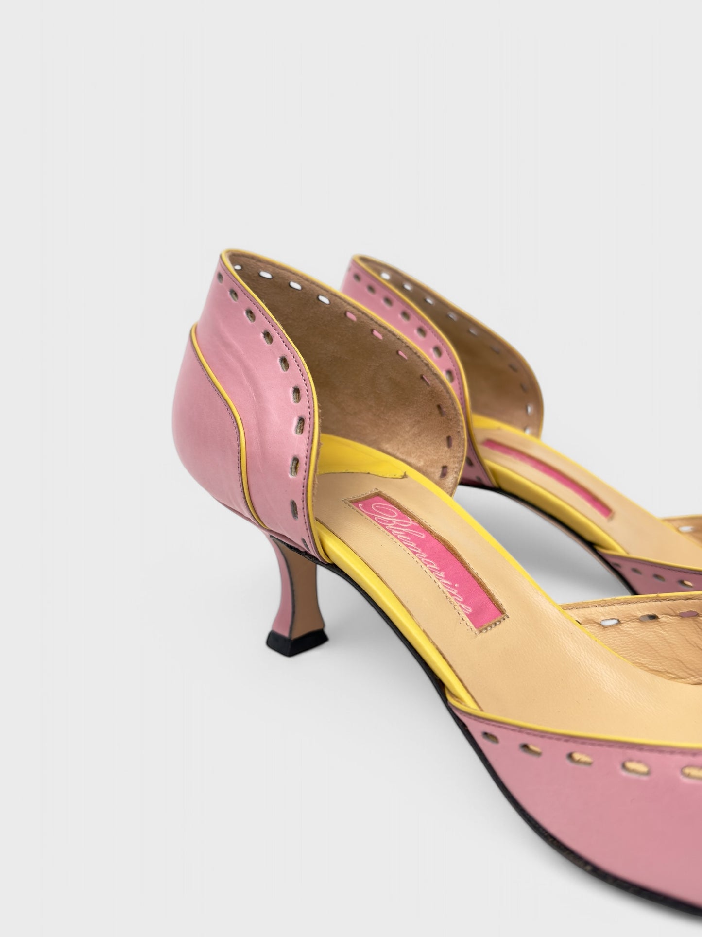 Blumarine mid-2000s pink and yellow leather kitten heel pumps.