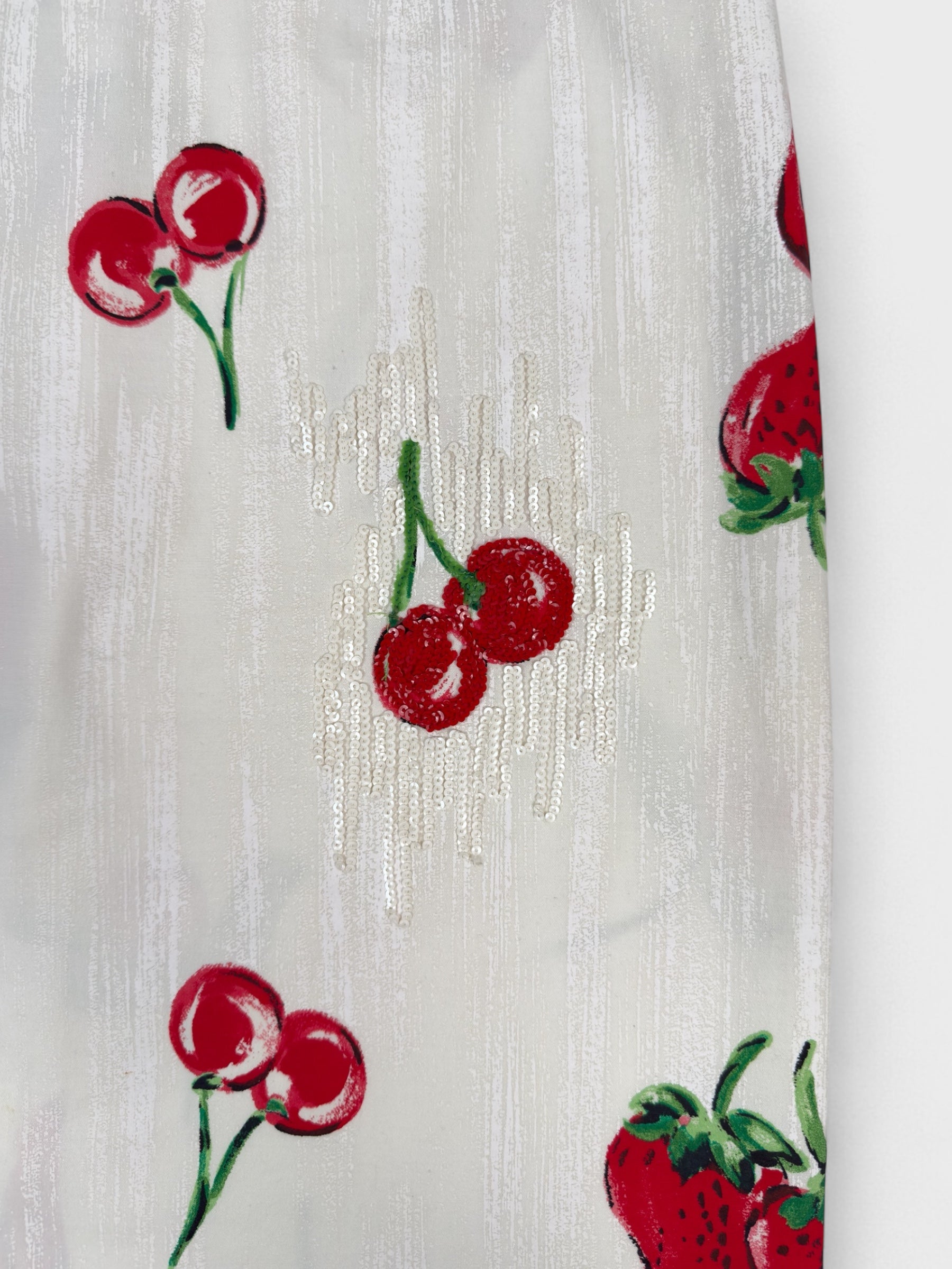 Blumarine early 2000s strawberry and cherry print skirt with sequin embellishment.