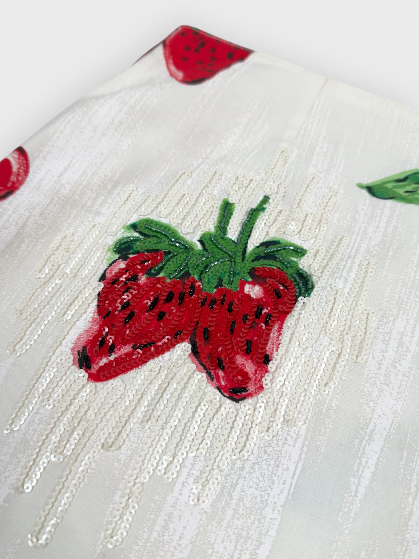 Blumarine early 2000s strawberry and cherry print skirt with sequin embellishment.