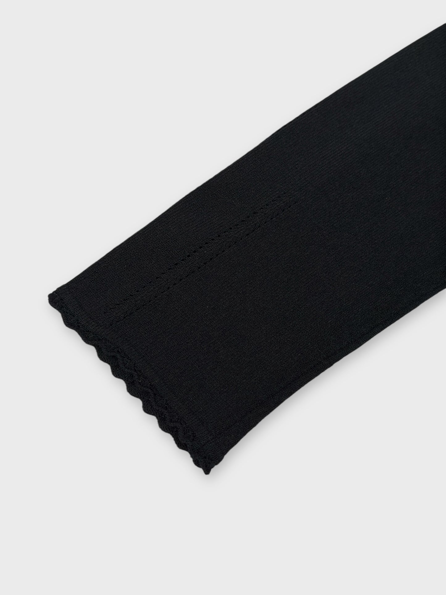 Blumarine early 2000s black knit top with crochet trim on the sleeves.