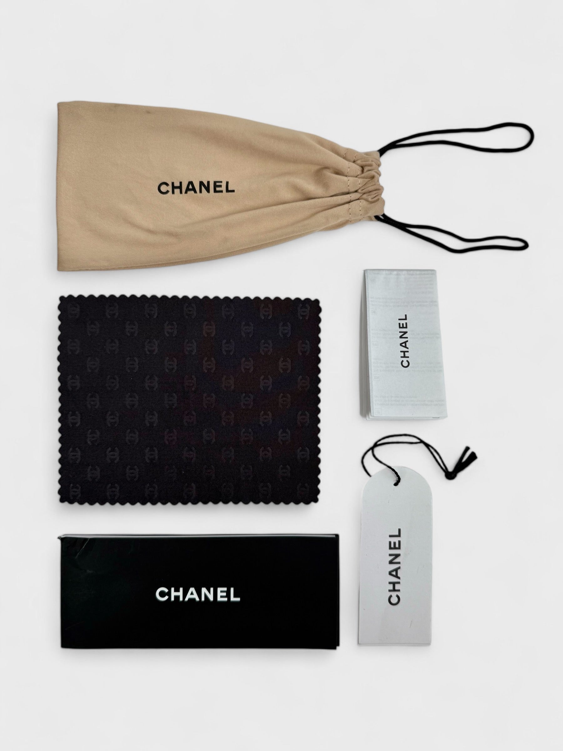 Chanel vintage 5027 sunglasses with oval frame and gold-tone details.