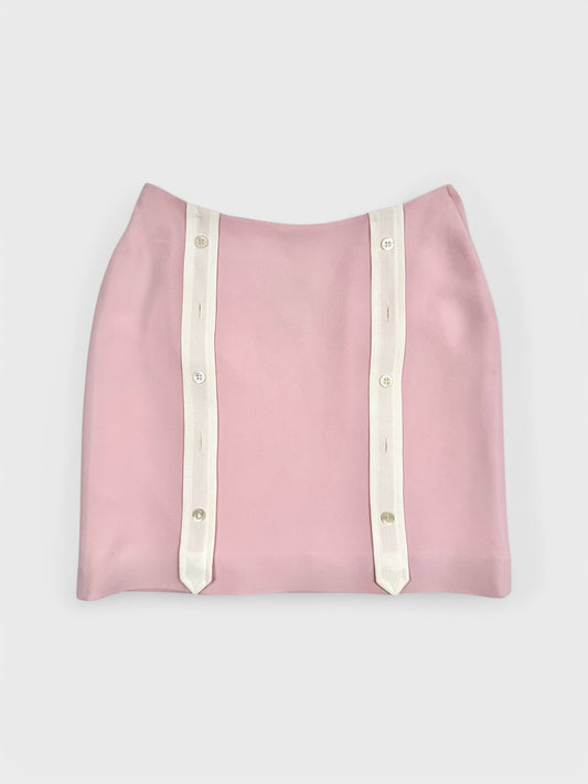 Cheap And Chic by Moschino 1990s pastel pink mini skirt with button decoration.