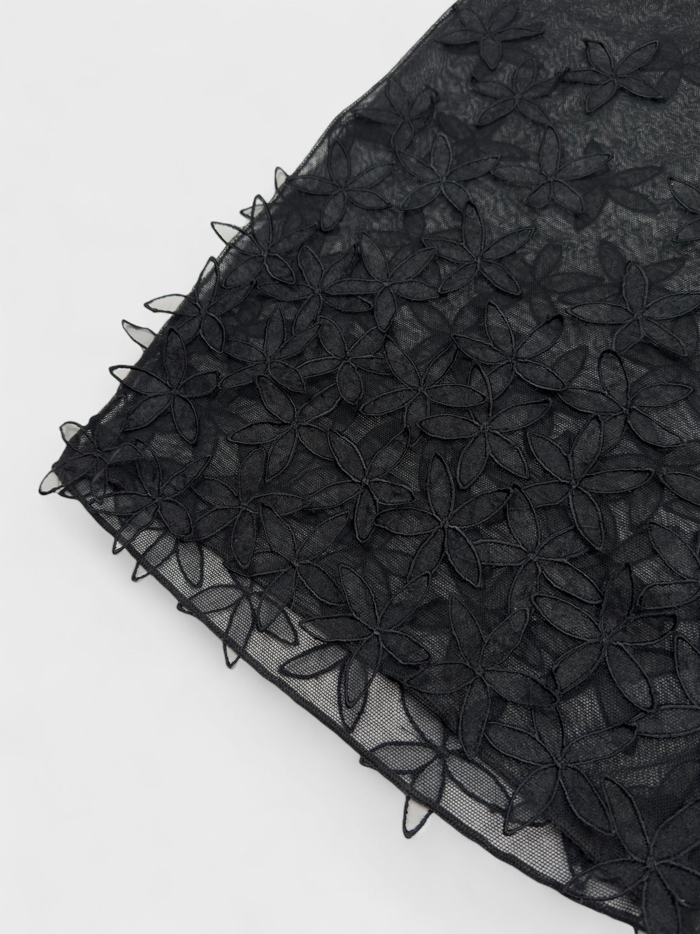 D&G by Dolce & Gabbana late-1990s black double mesh skirt with 3D floral appliqués.