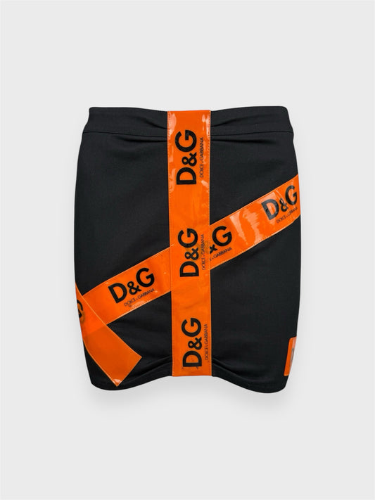 D&G by Dolce&Gabbana FW 2003 mini skirt with orange tape-effect details.