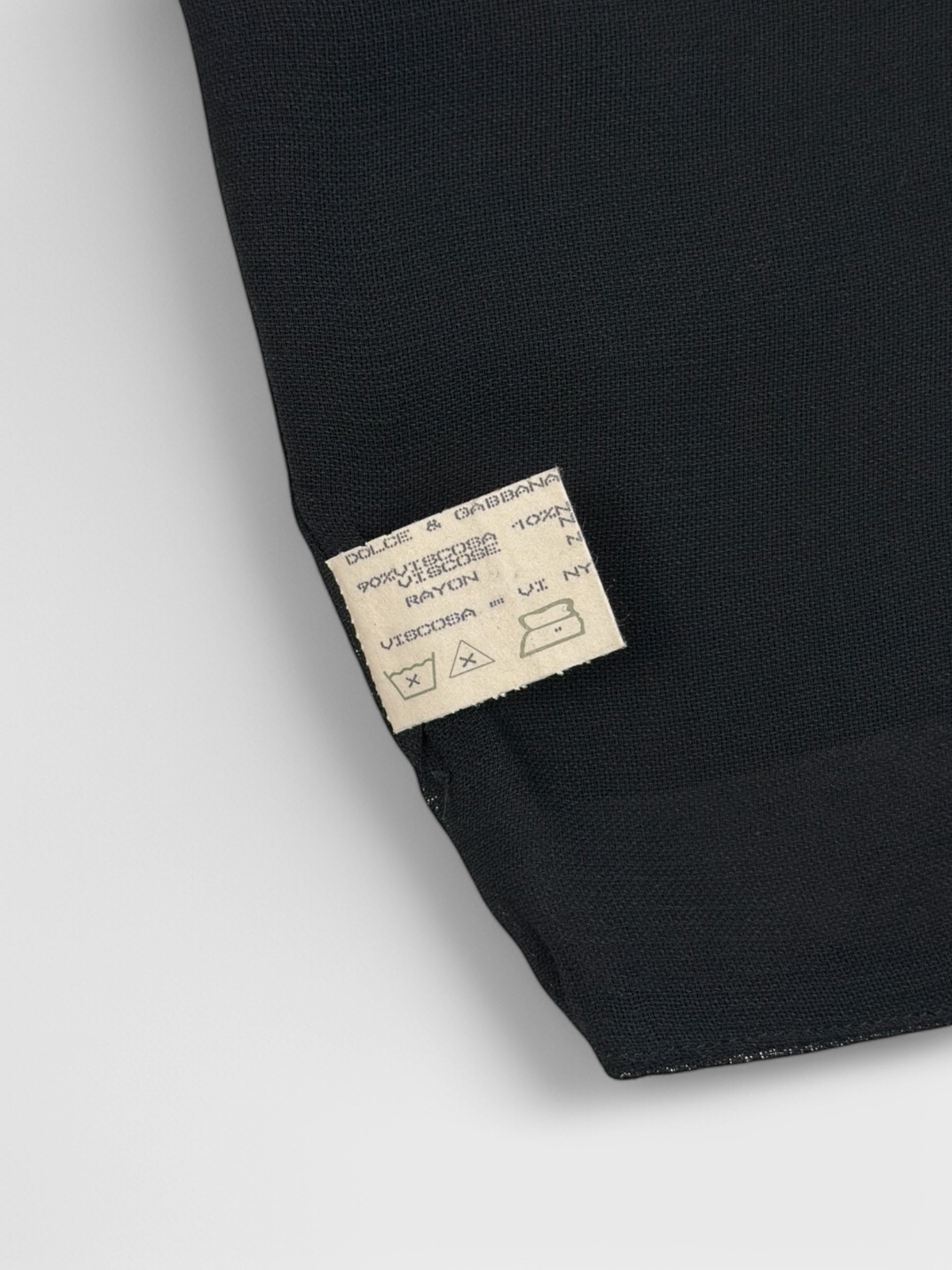 Dolce & Gabbana early 1990s black lace mini skirt with exposed trim.