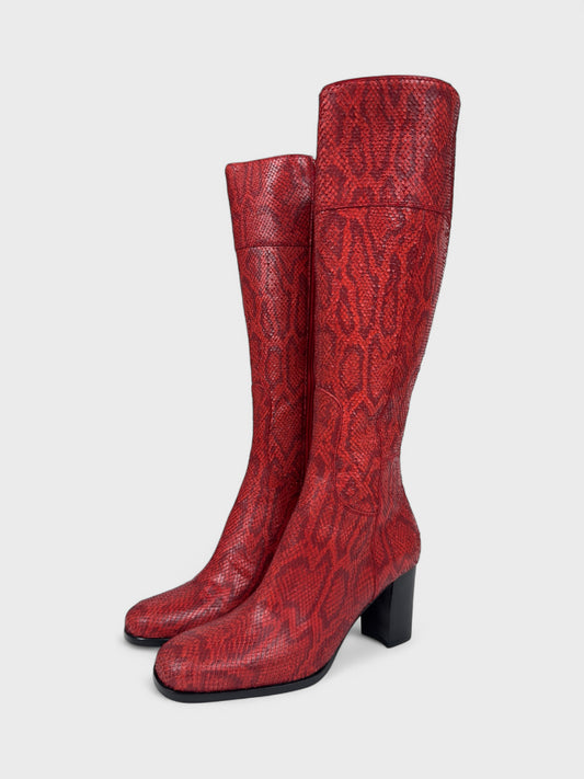 Dolce & Gabbana FW 1995 runway red python-effect leather boots with raised scales.
