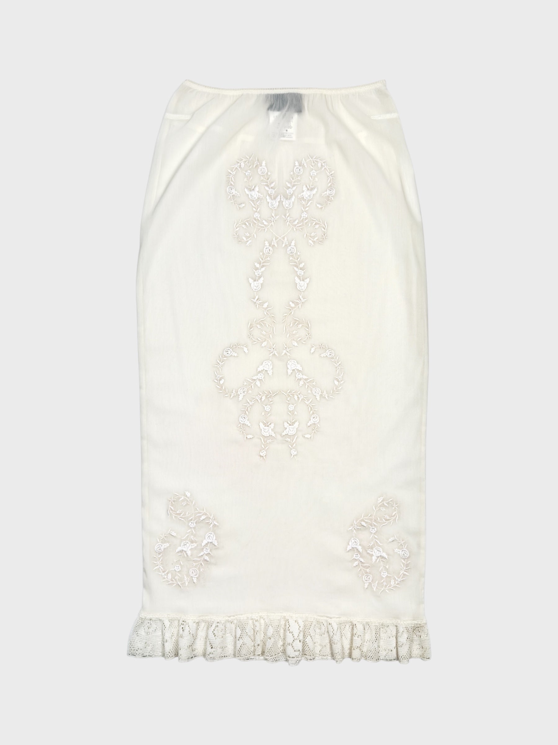 Dolce & Gabbana SS 1999 embroidered ivory pencil skirt with lace detailing and semi-transparent fabric.