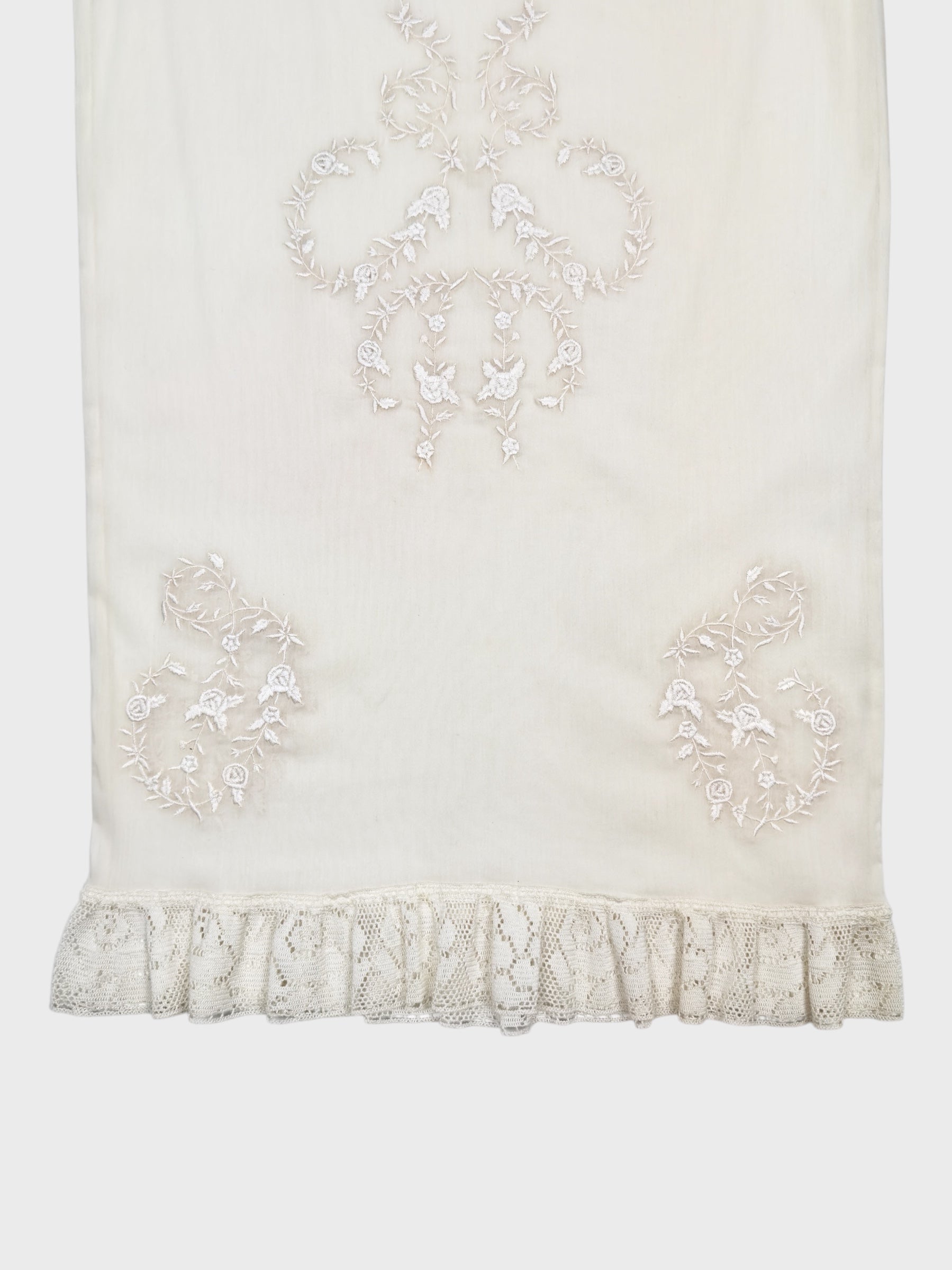 Dolce & Gabbana SS 1999 embroidered ivory pencil skirt with lace detailing and semi-transparent fabric.