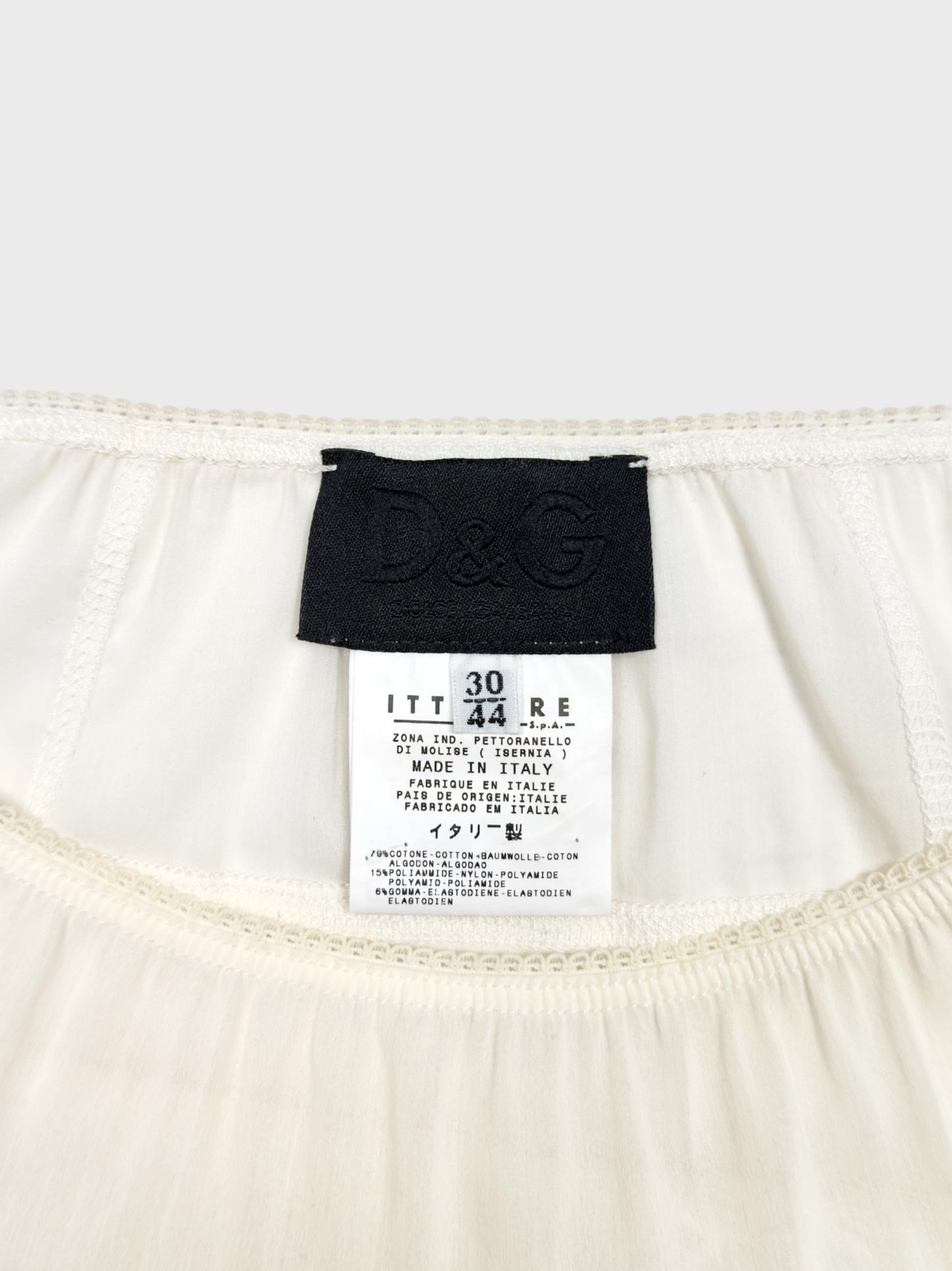 Dolce & Gabbana SS 1999 embroidered ivory pencil skirt with lace detailing and semi-transparent fabric.