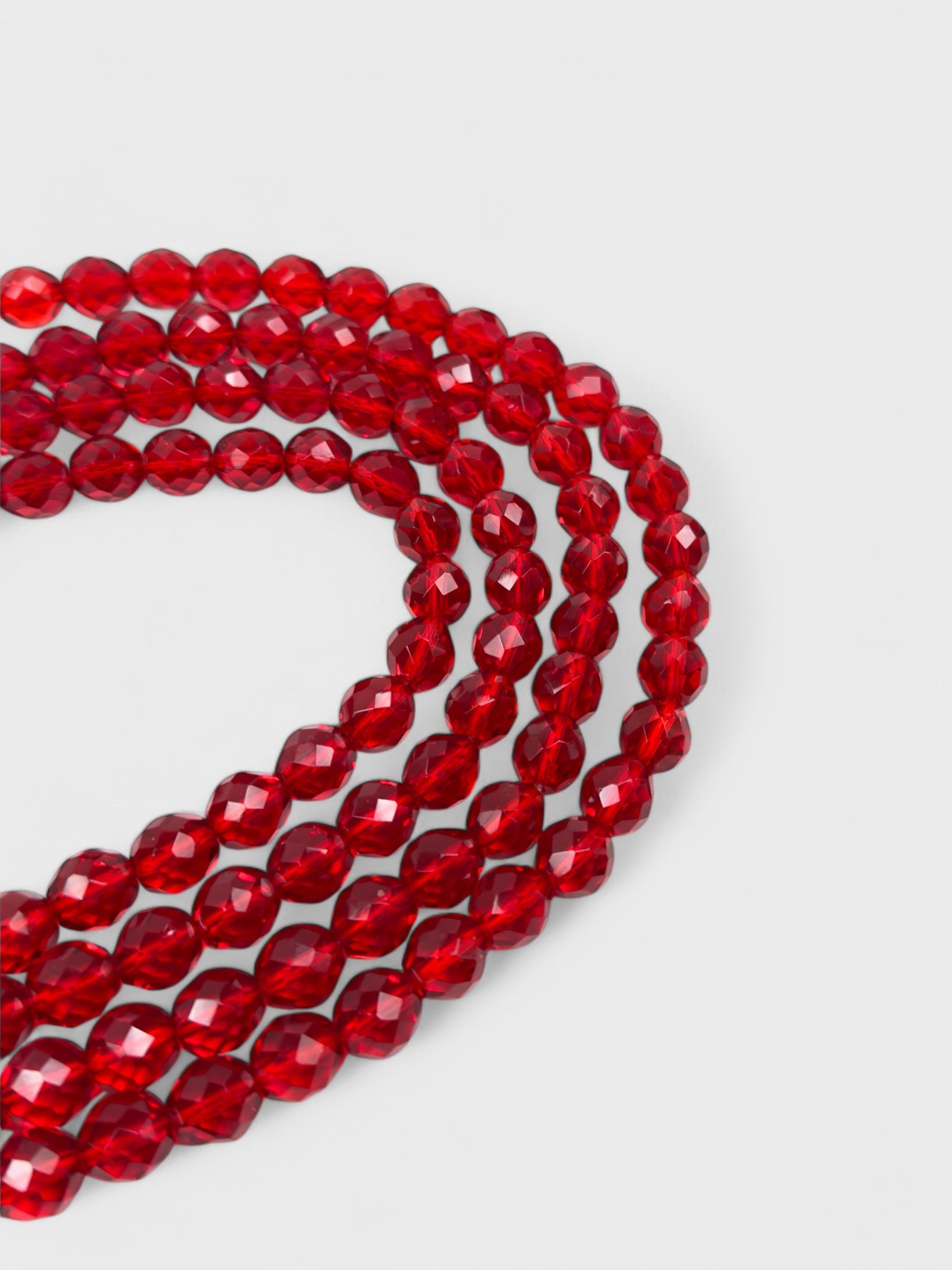 Gianni Versace 1980s beaded belt with red faceted beads and metal buckle.