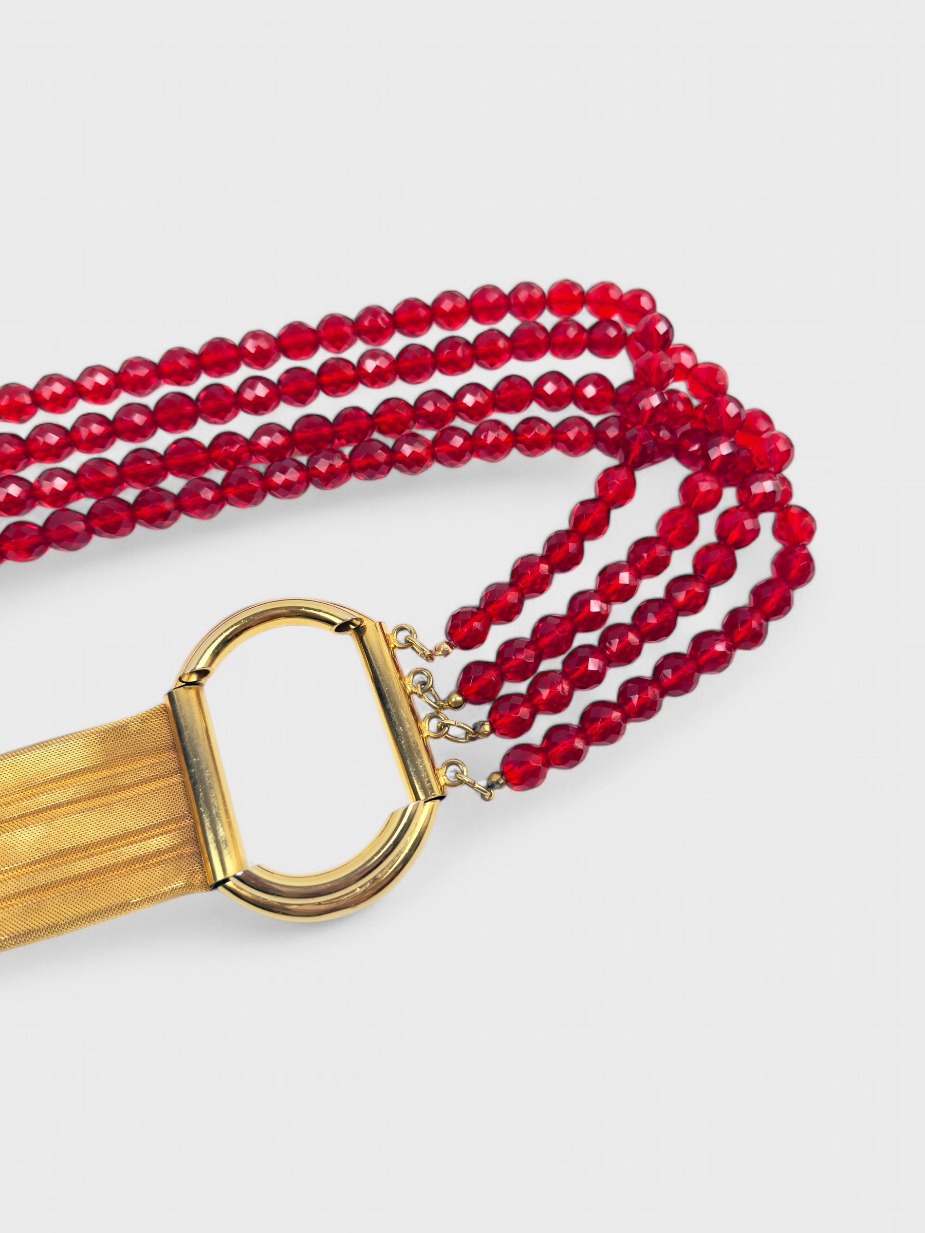 Gianni Versace 1980s beaded belt with red faceted beads and metal buckle.