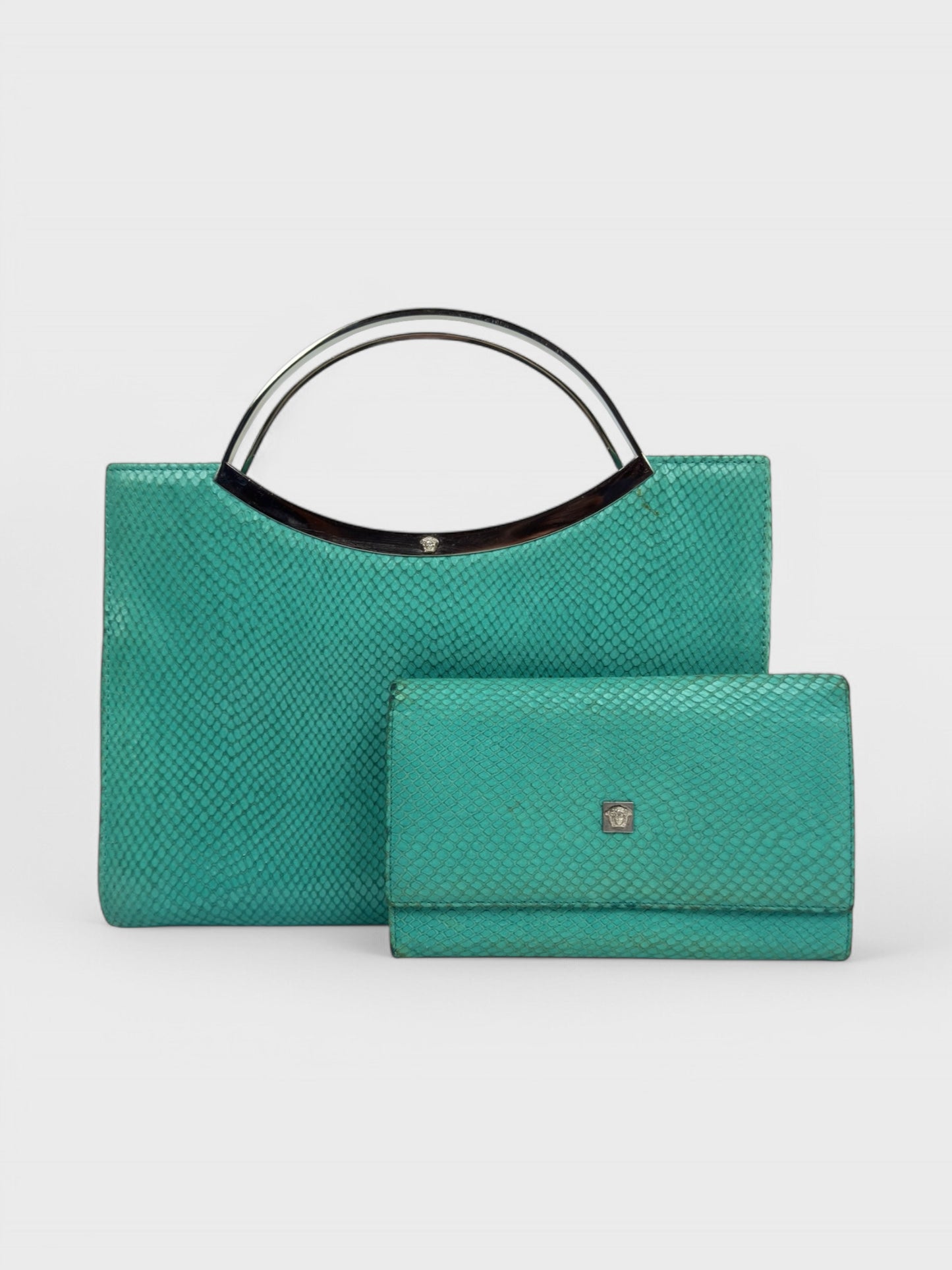 Gianni Versace SS 1999 turquoise python-effect leather frame bag with metal handles.