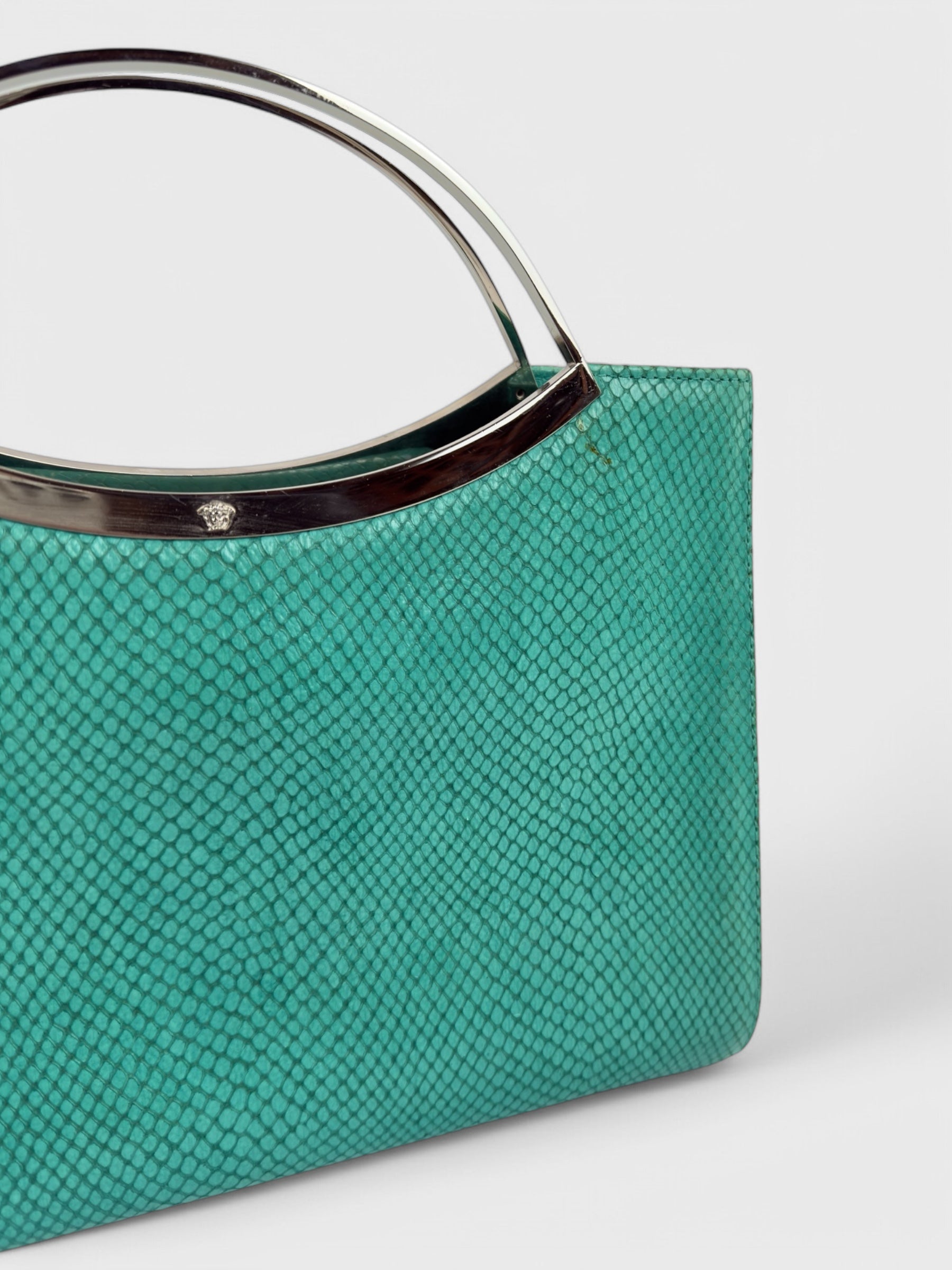 Gianni Versace SS 1999 turquoise python-effect leather frame bag with metal handles.
