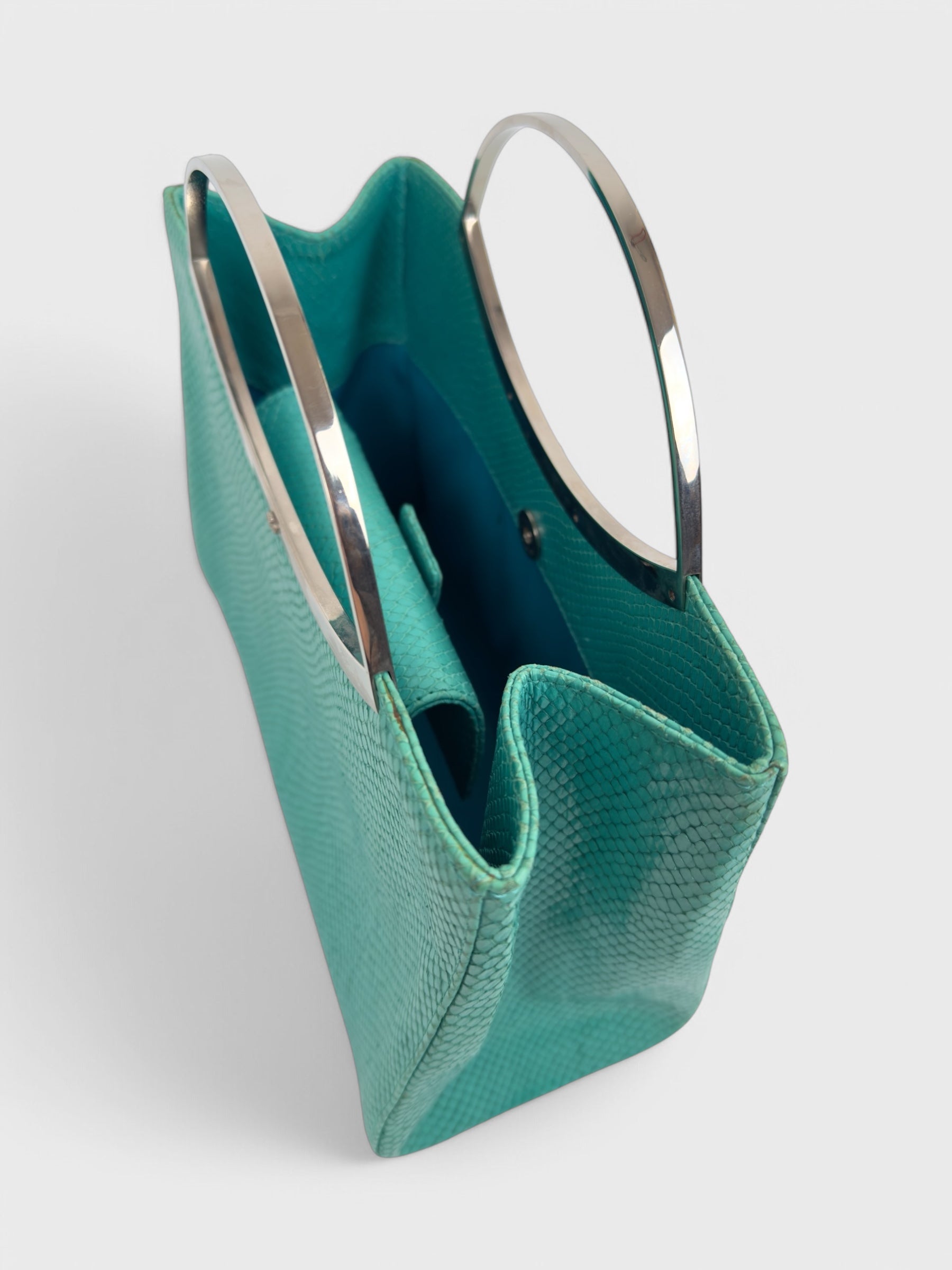 Gianni Versace SS 1999 turquoise python-effect leather frame bag with metal handles.