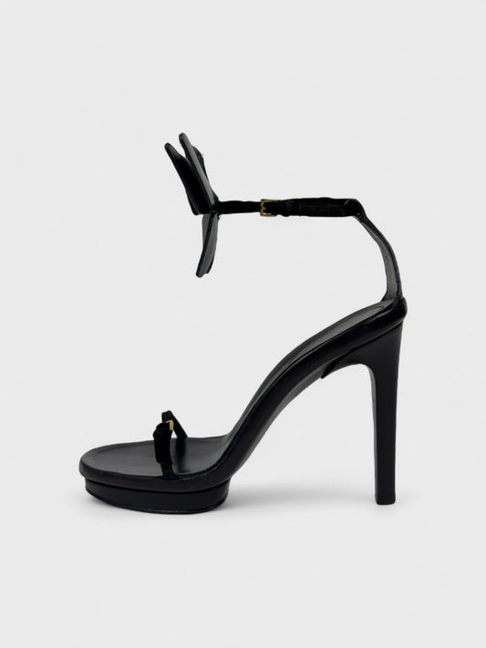 Gucci SS 2002 runway platform heels with movable butterfly detail and adjustable leather straps.