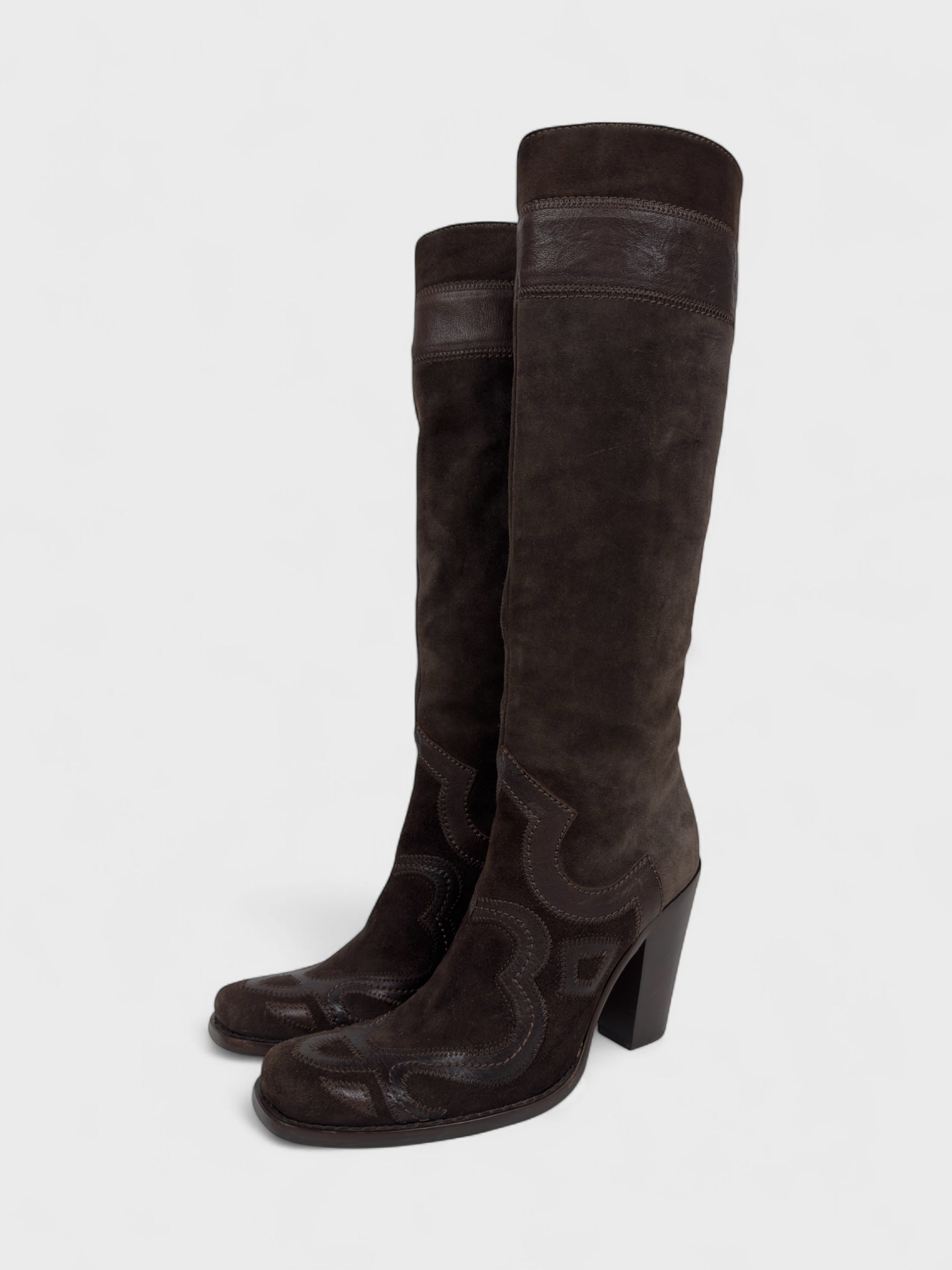 Vintage Miu Miu 2000s–2010s brown suede camperos boots with embroidered detailing and high heel.