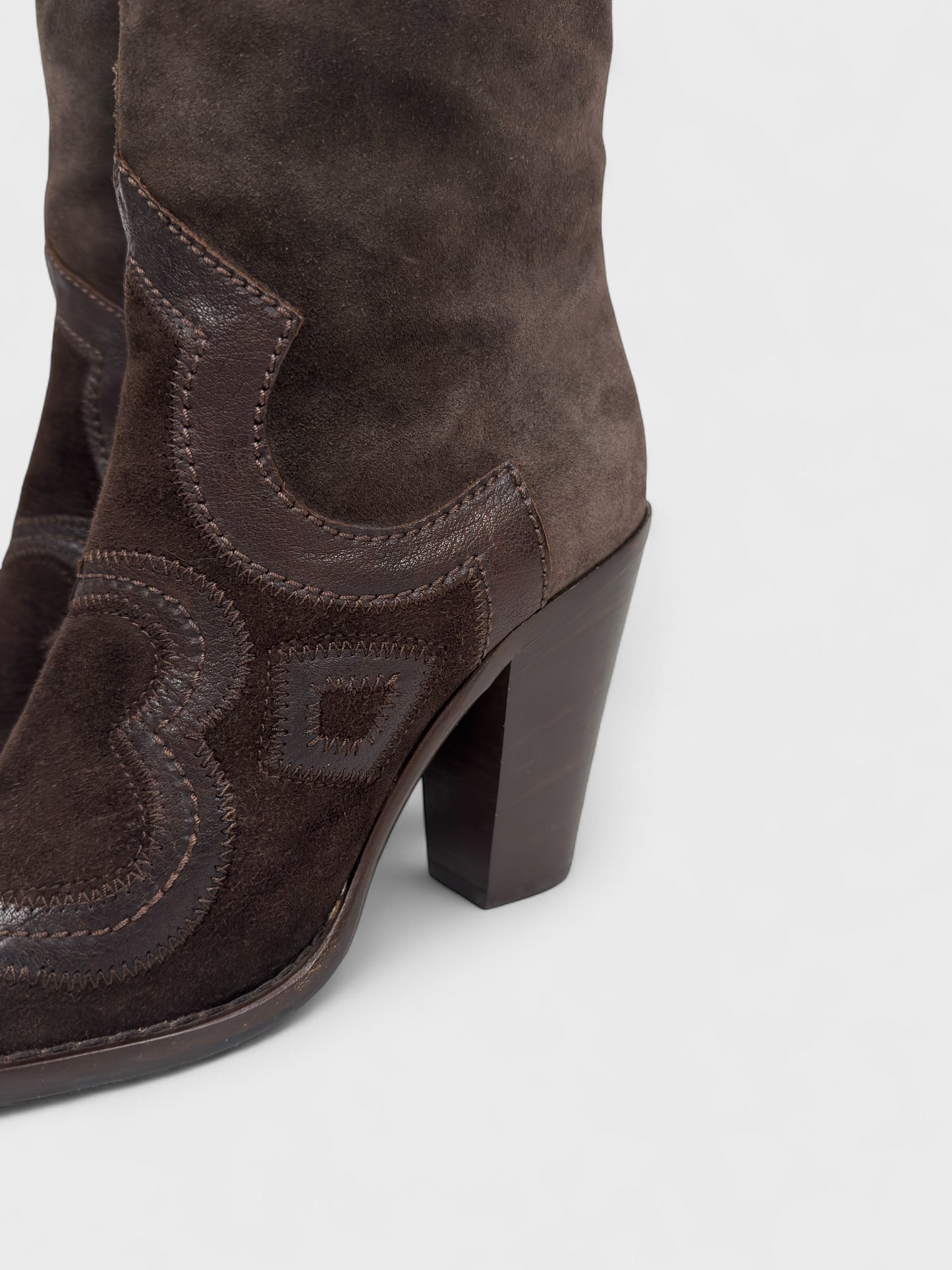 Vintage Miu Miu 2000s–2010s brown suede camperos boots with embroidered detailing and high heel.