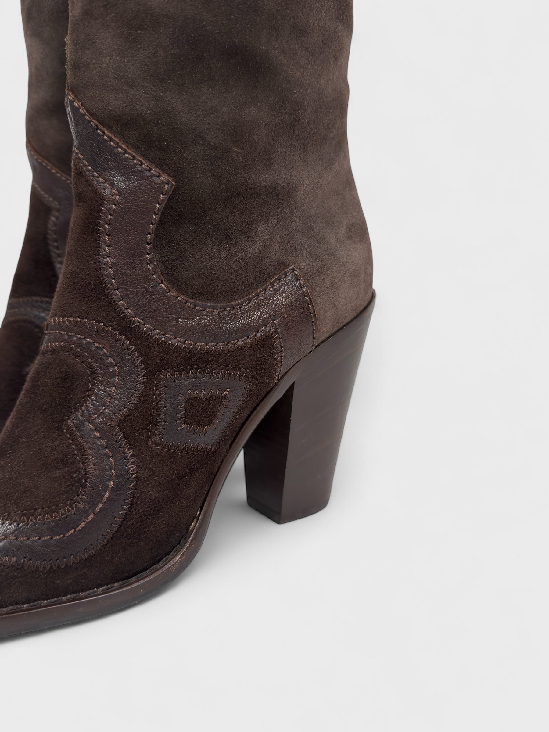 Vintage Miu Miu 2000s–2010s brown suede camperos boots with embroidered detailing and high heel.