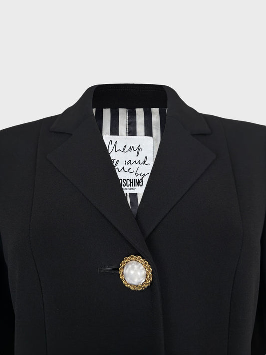 Moschino Cheap And Chic 1990s black blazer with gold jewel buttons.