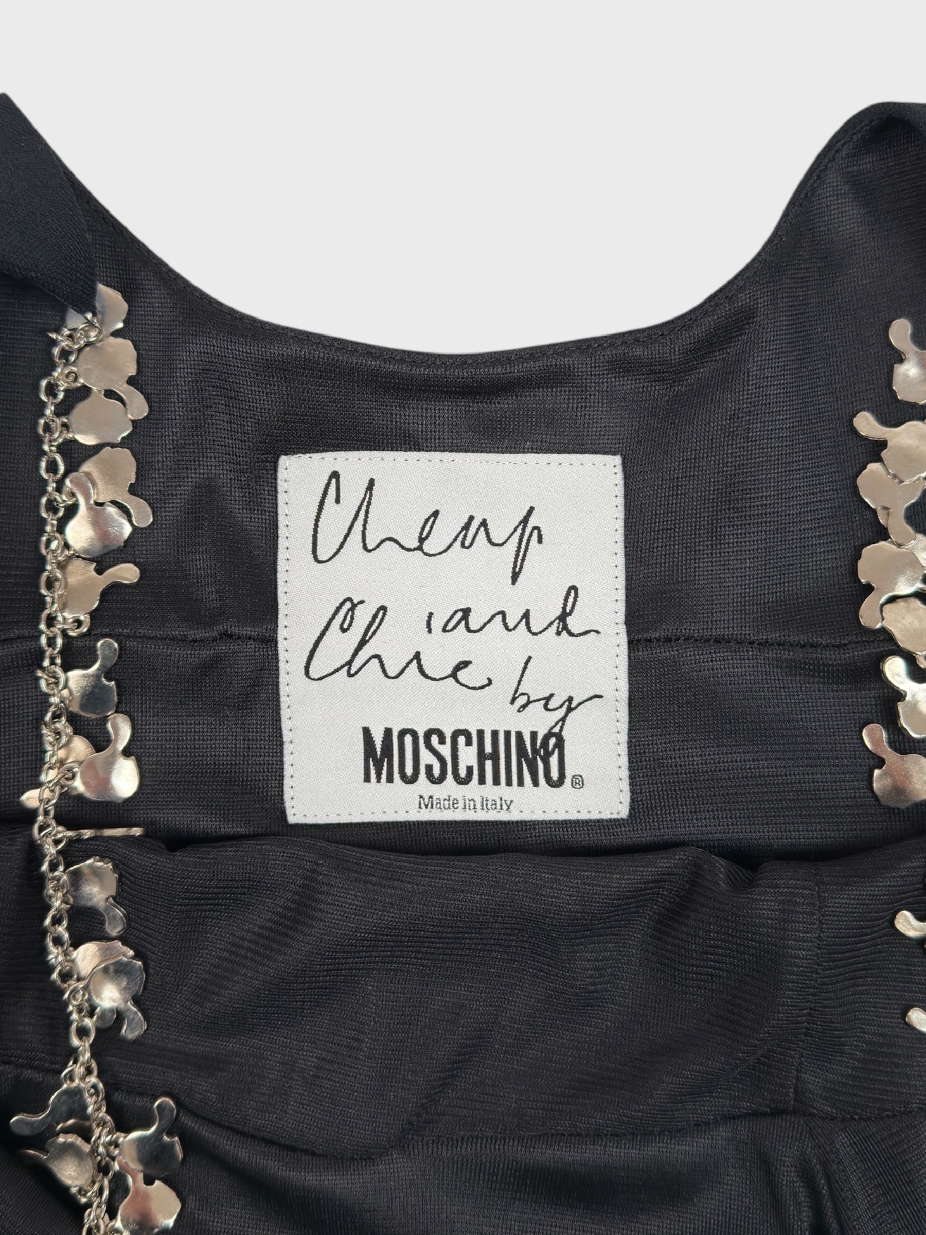 Moschino Cheap And Chic 1990s black mini dress with metallic charm shoulder straps.