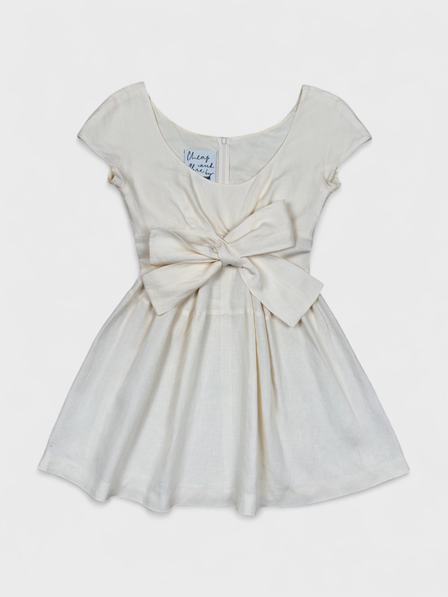 Moschino Cheap And Chic 1990s linen bow dress with front ribbon detail.