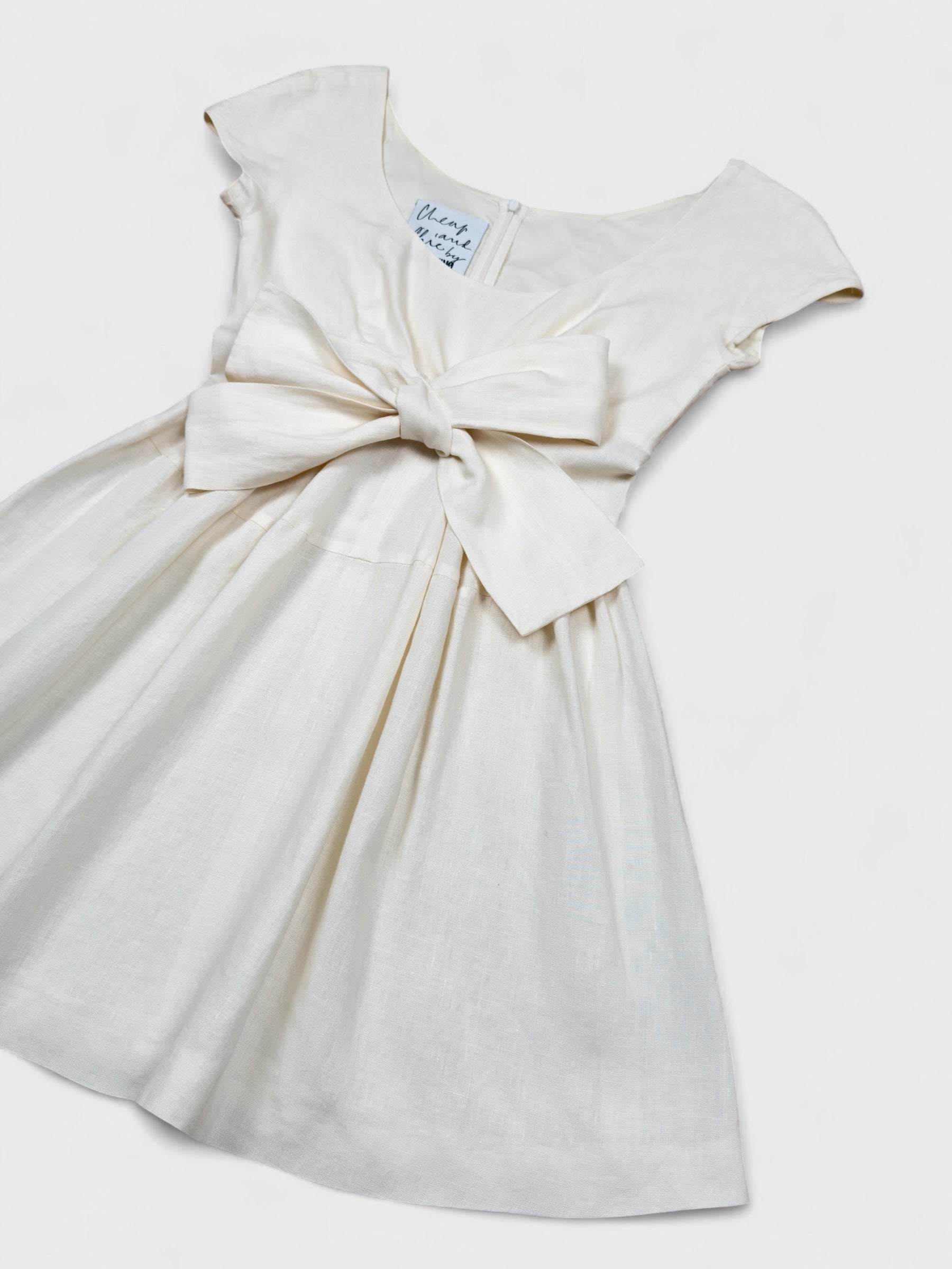 Moschino Cheap And Chic 1990s linen bow dress with front ribbon detail.