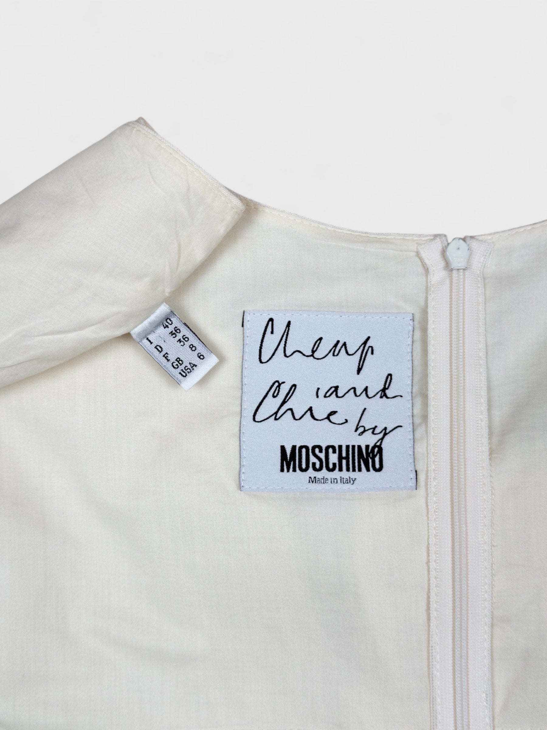 Moschino Cheap And Chic 1990s linen bow dress with front ribbon detail.