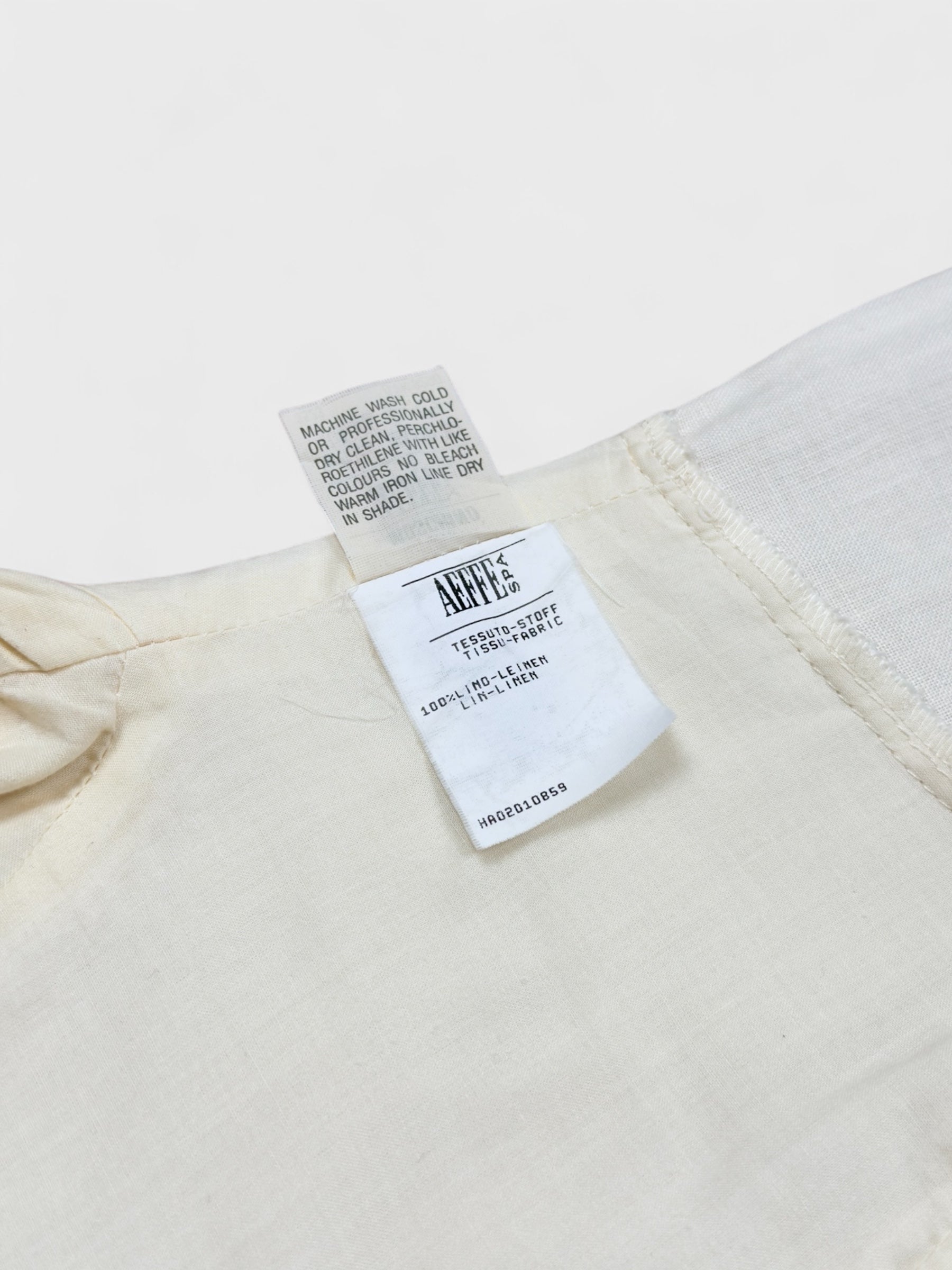 Moschino Cheap And Chic 1990s linen bow dress with front ribbon detail.