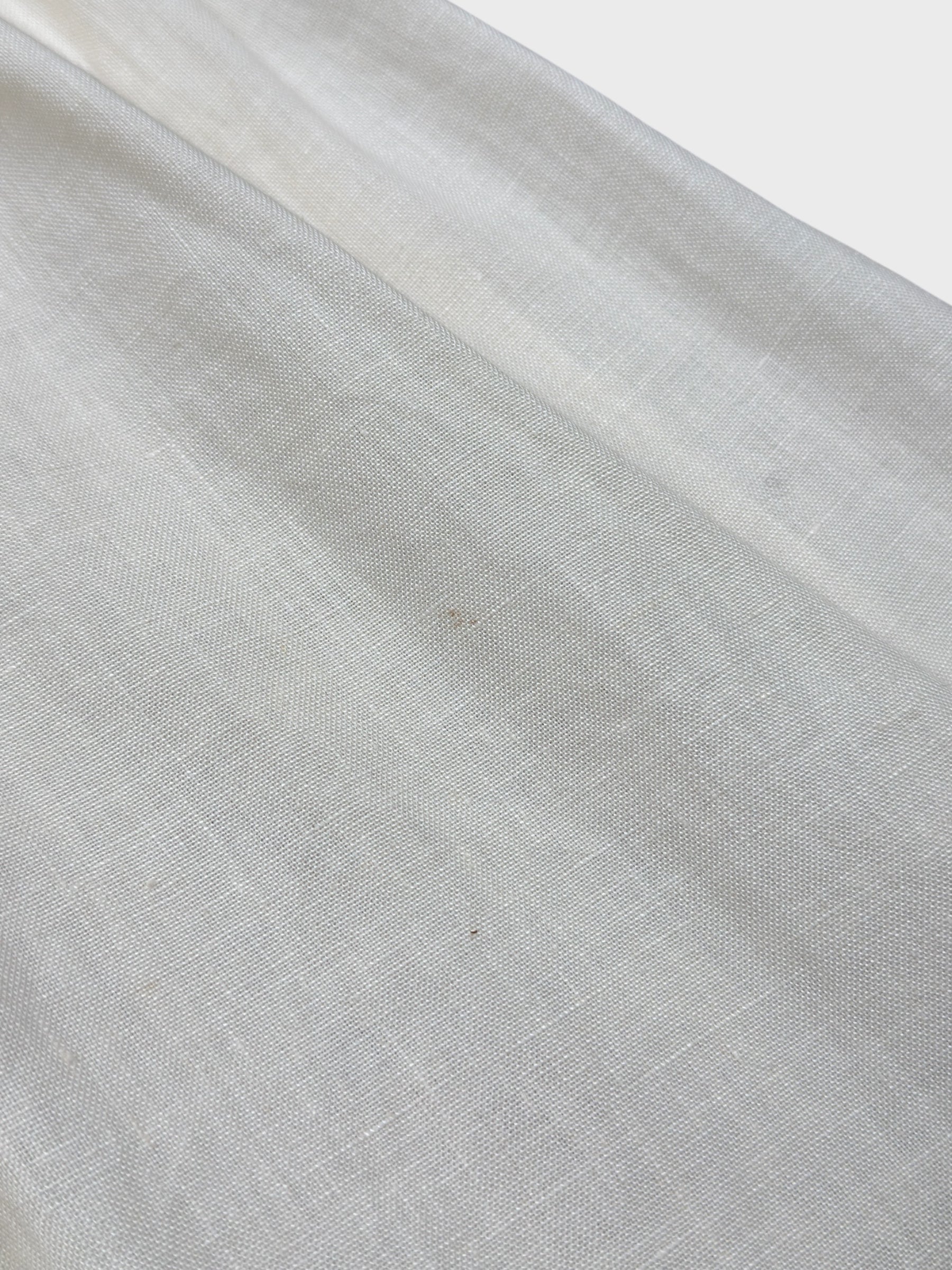 Moschino Cheap And Chic 1990s linen bow dress with front ribbon detail.