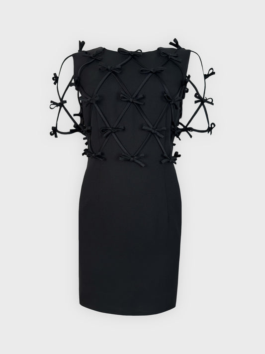Moschino Cheap And Chic 1990s black dress with multiple bow ribbons.