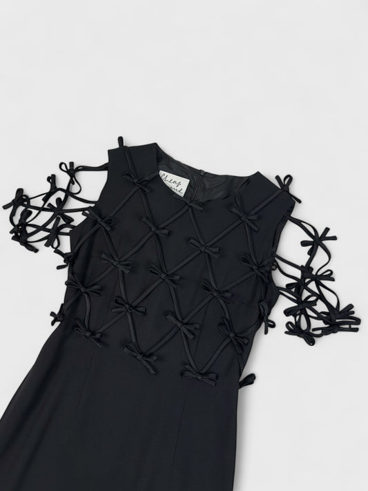 Moschino Cheap And Chic 1990s black dress with multiple bow ribbons.