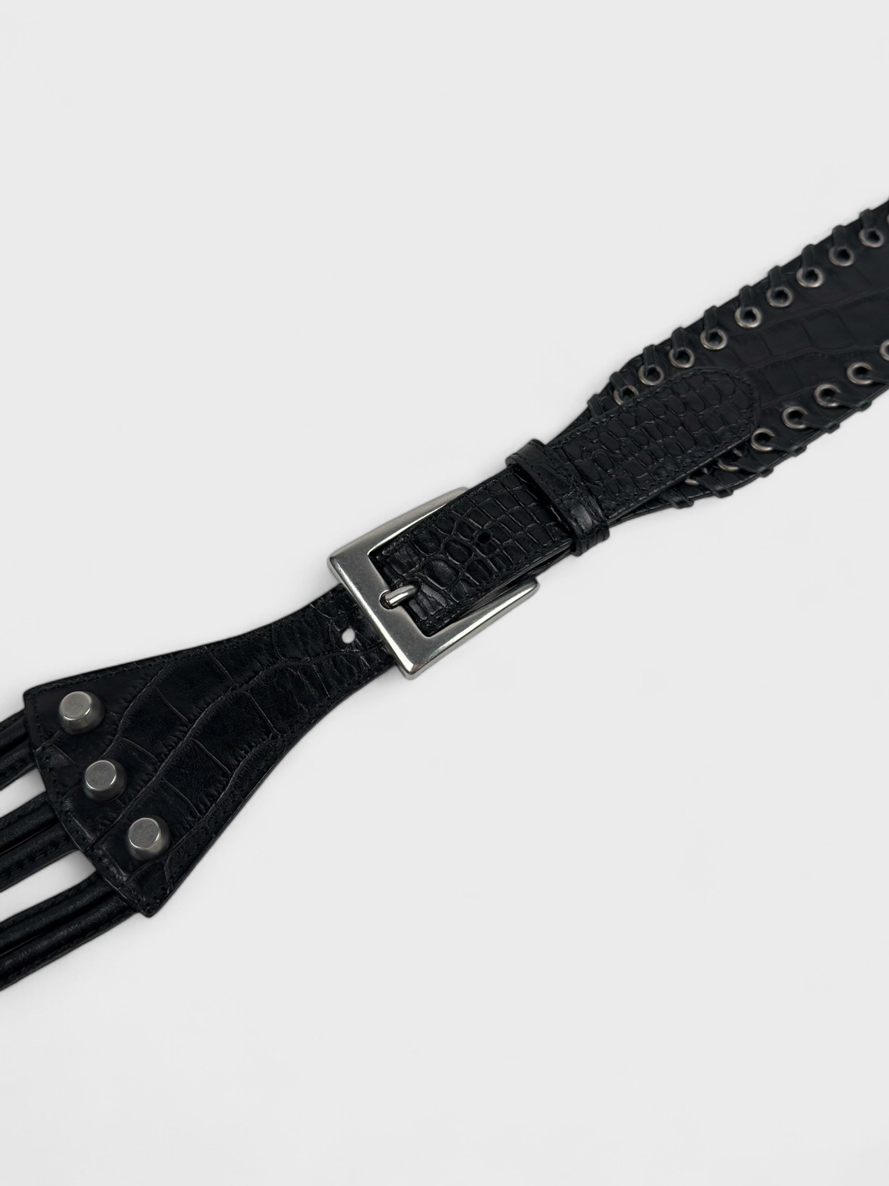 Versace early-2000s black crocodile-effect leather belt with gothic logo buckle.