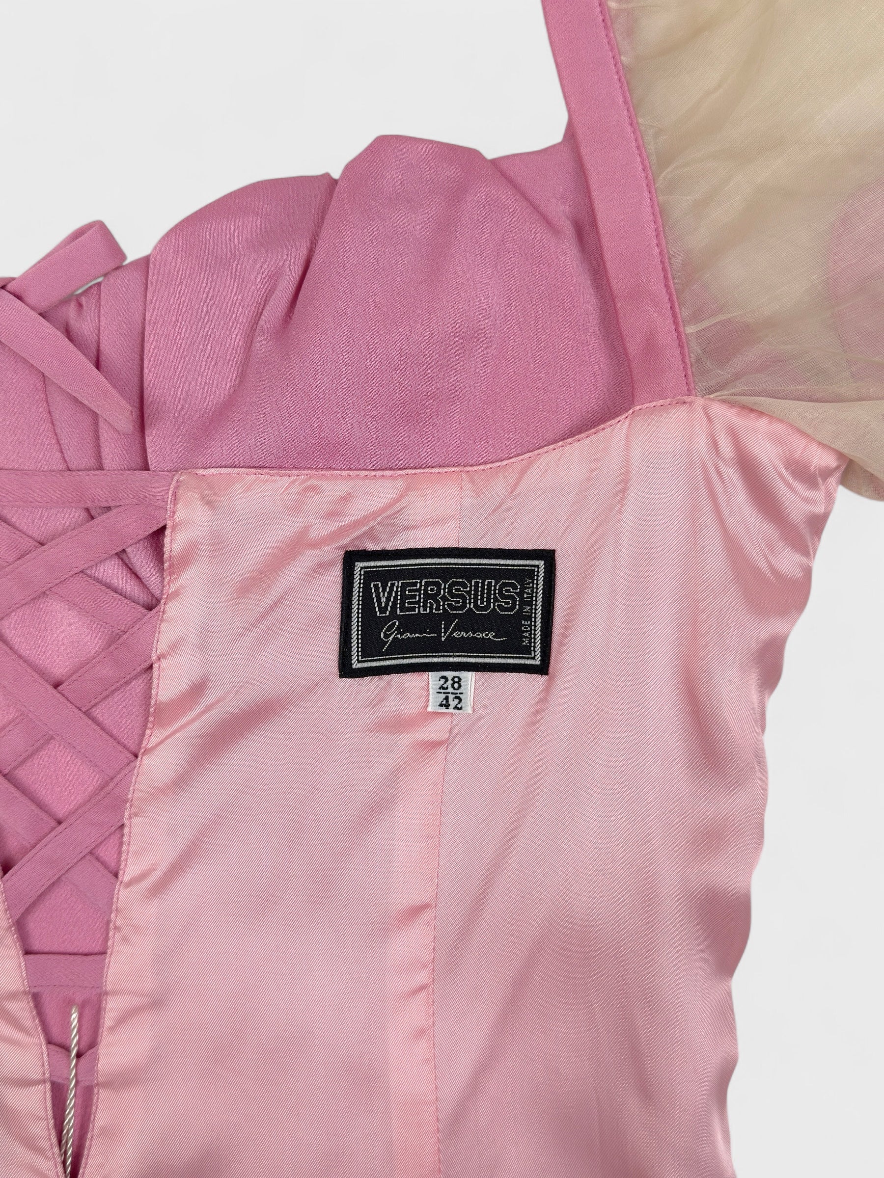 Versus by Gianni Versace 1990s pink satin dress with sheer balloon sleeves and back cut-out.