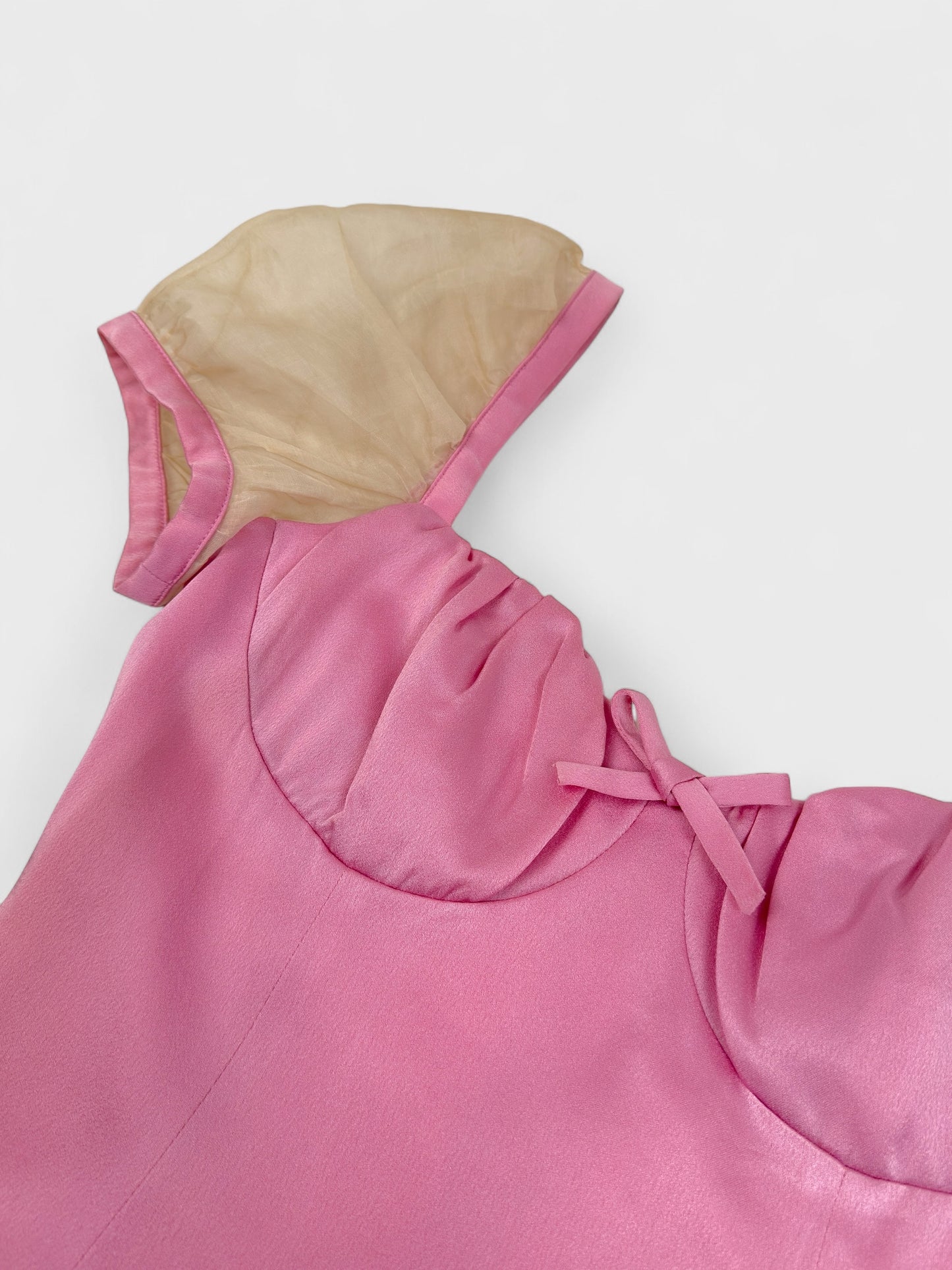 Versus by Gianni Versace 1990s pink satin dress with sheer balloon sleeves and back cut-out.