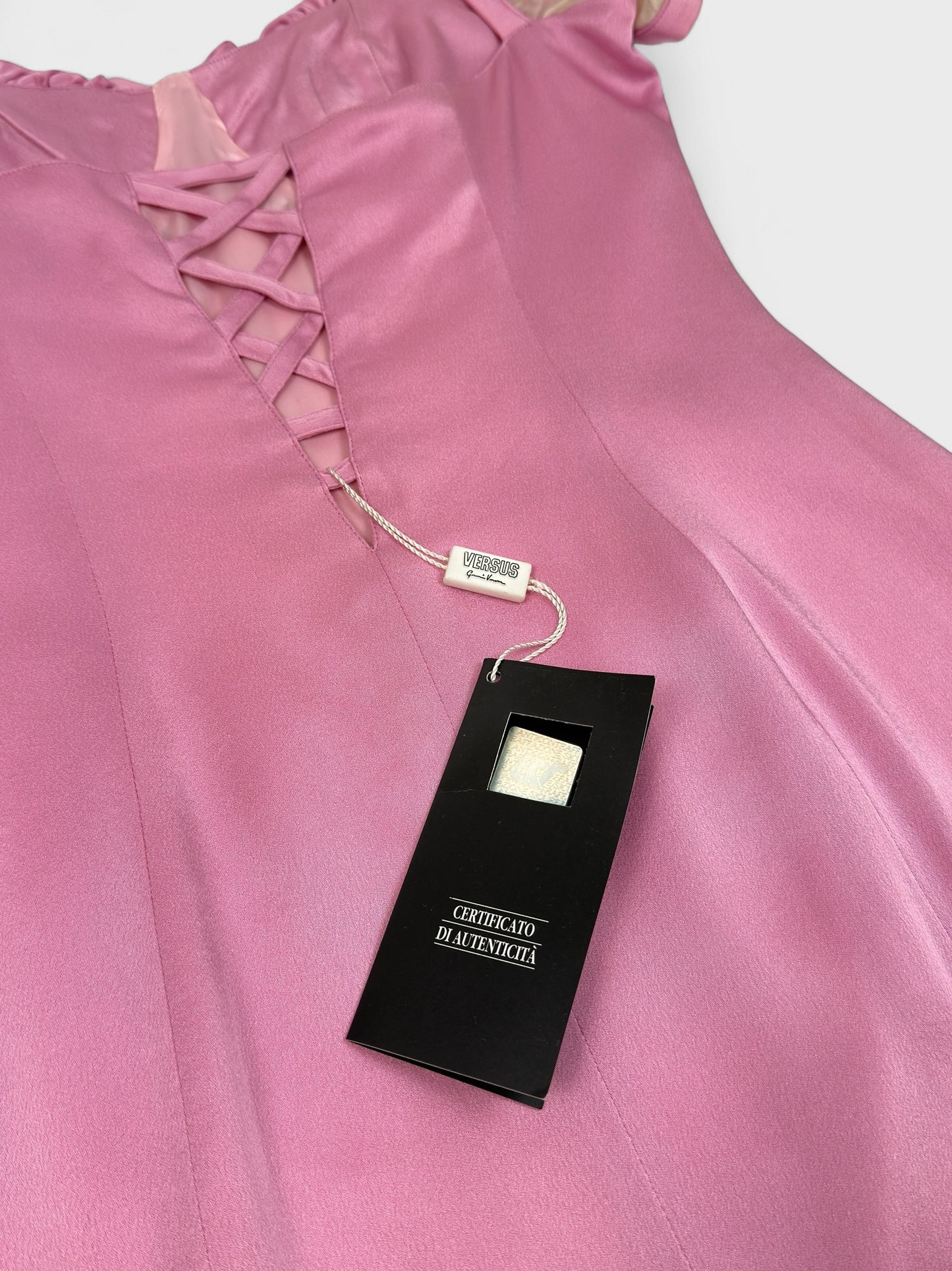Versus by Gianni Versace 1990s pink satin dress with sheer balloon sleeves and back cut-out.