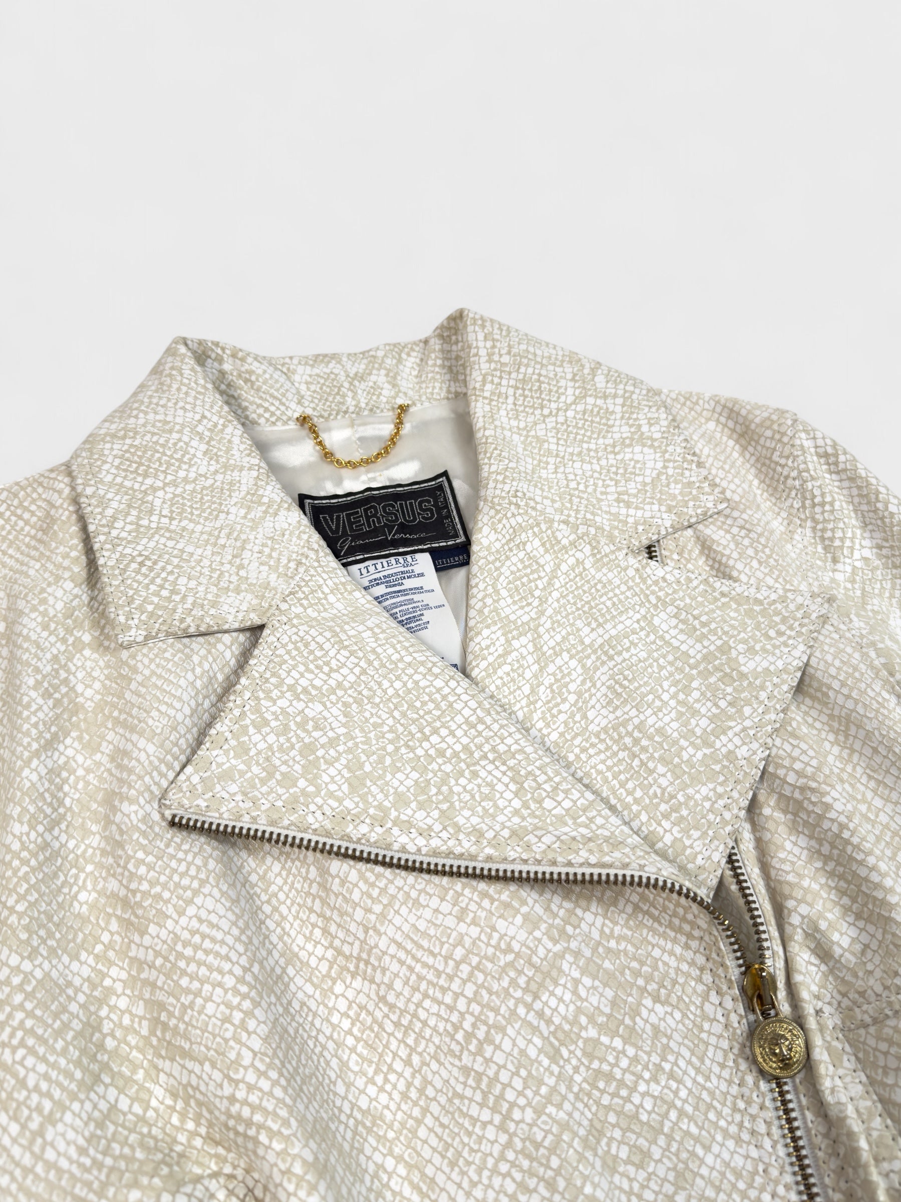 Versus by Gianni Versace 1990s beige python-effect leather jacket with gold hardware.