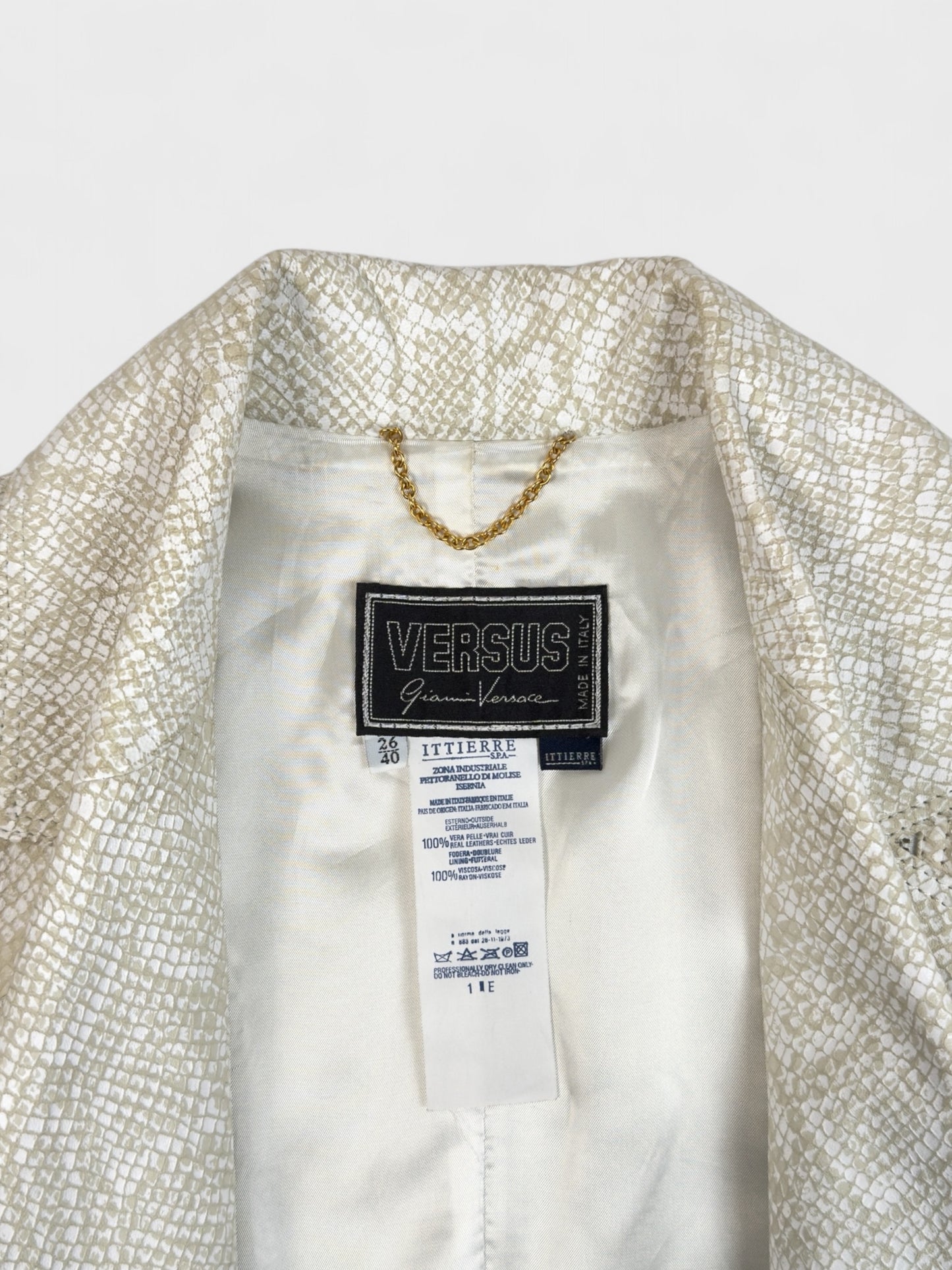 Versus by Gianni Versace 1990s beige python-effect leather jacket with gold hardware.